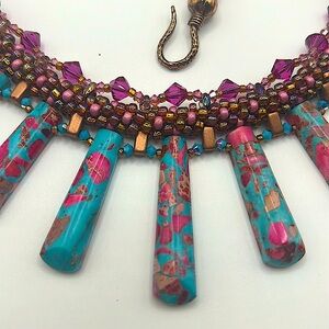 Beautiful multi pendant necklace handwoven with Swarovski beads in Kumihimo